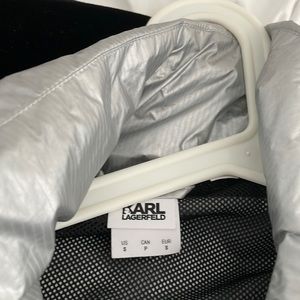 This is a never worn karl largerfeld puma windbreaker style jacket.